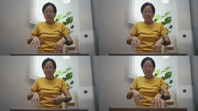 亚洲老年女性锻炼身体和做瑜伽。