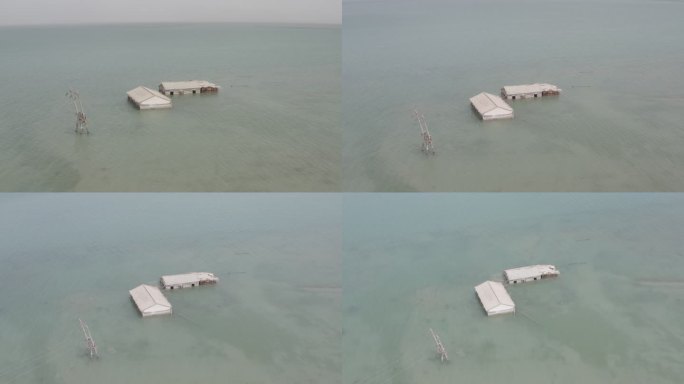 4K航拍青海水雅丹景区被淹没的小屋