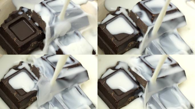 牛奶巧克力溅到巧克力块上，巧克力块上的牛奶被倒入固体巧克力上