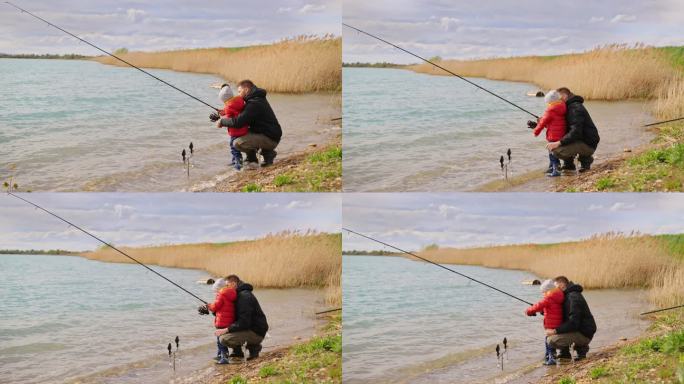 父亲和儿子在河上摇鱼竿