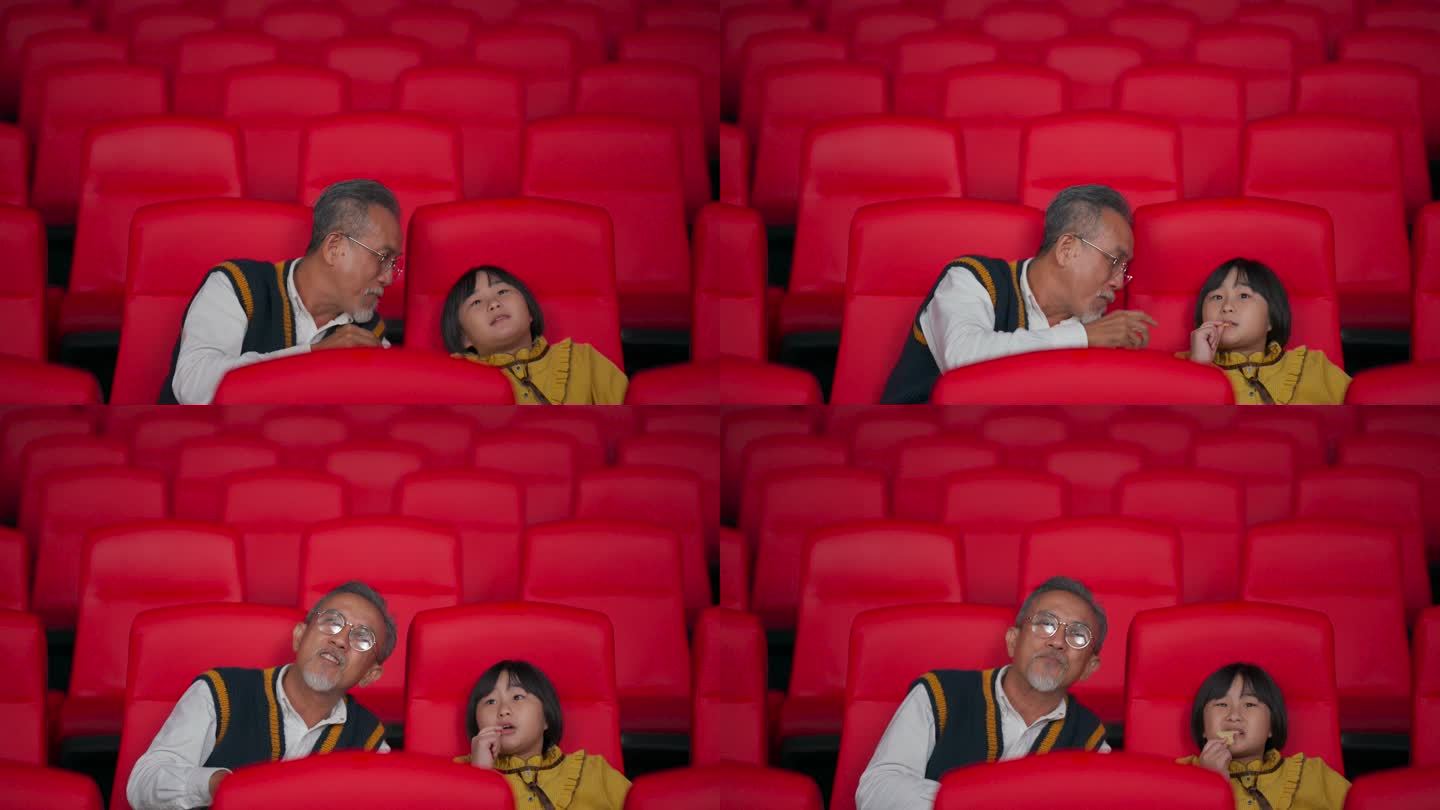 亚洲华裔活跃老人和他的孙女喜欢在电影院看电影