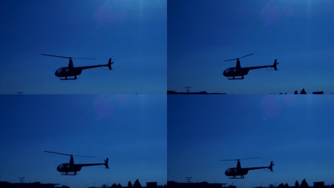 飞行中的直升机傍晚飞机巡逻夜空飞机黑影晚