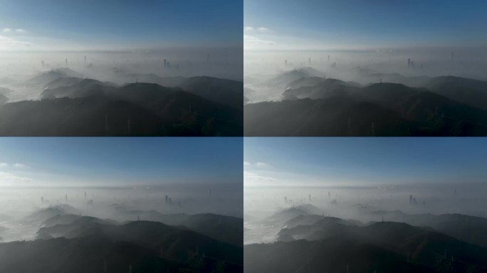 向前飞航拍深圳平流雾城市景观