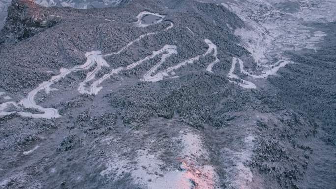 杭州临安航拍山区华浪线乡村盘山公路雪景