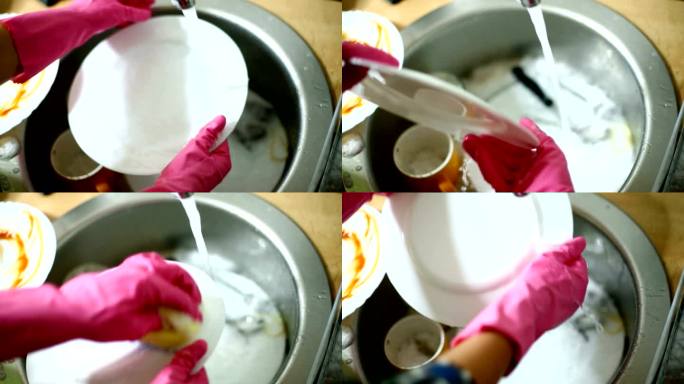 洗碗程序。家庭主妇洗碗刷盘子节约水