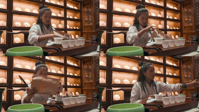 卖茶视频茶店里泡茶喝茶品茶的民族女子