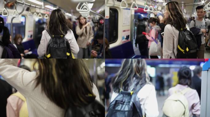 台湾妇女离开地铁通行出行