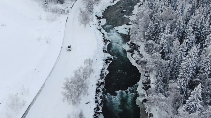 新疆喀纳斯冰河森林公路汽车航拍 冰雪森林