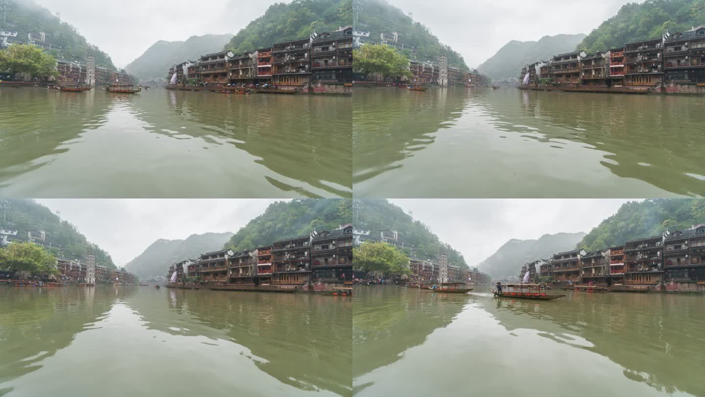 凤凰古镇雨天传统船只的时间流逝