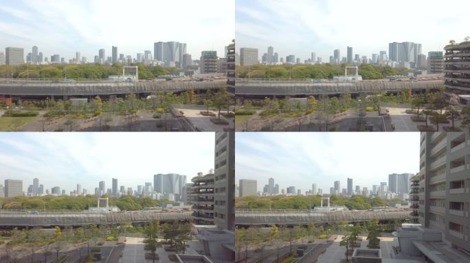 从移动的火车上可以看到东京市和滨立急花园。