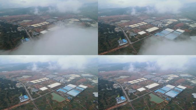 云层上面逐渐露出工业园区