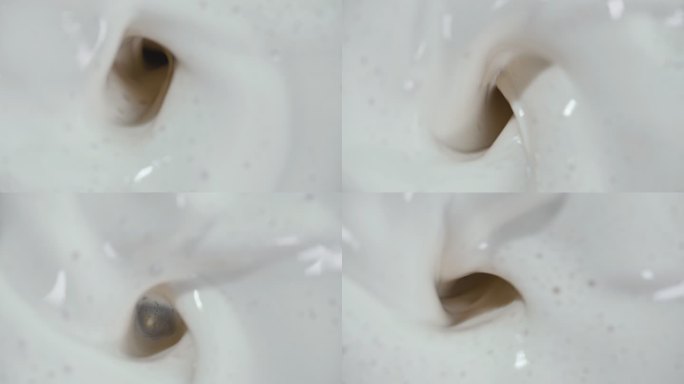慢动作混合牛奶漩涡白色漩涡