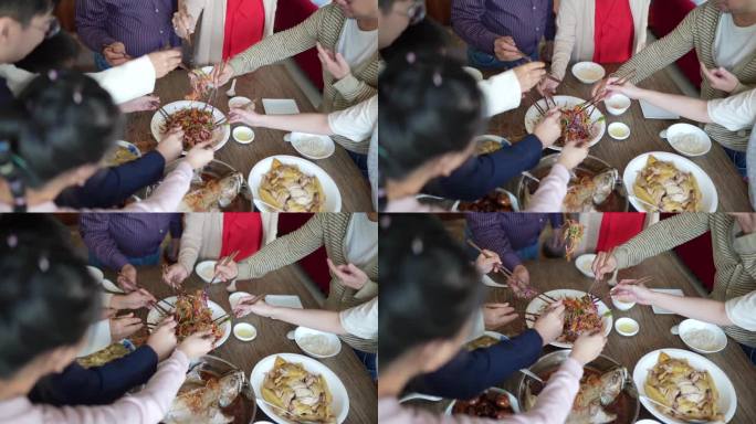 亚洲华人家庭用传统食物庆祝除夕