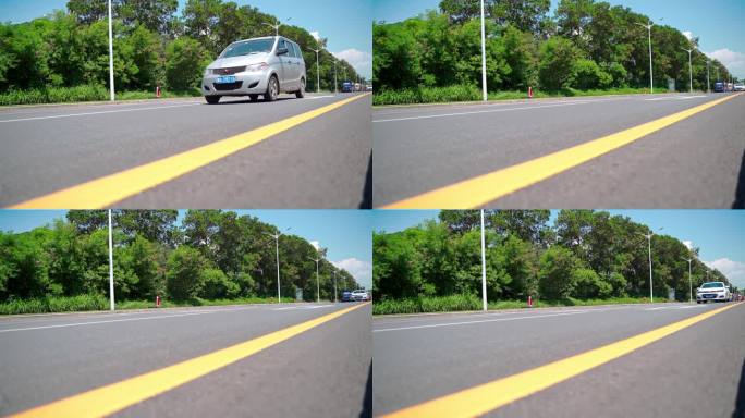 低角度汽车在马路缓慢行驶