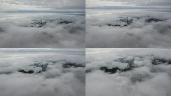 航拍高山云海中的电视信号塔