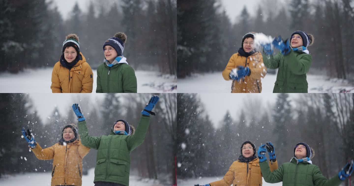 十几岁的男孩正在享受冬日的第一场雪