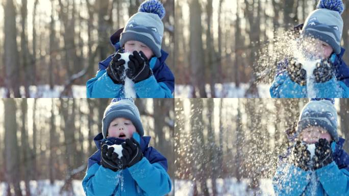 冬天森林里吹雪的小男孩