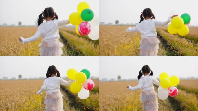 女孩气球稻田里奔跑