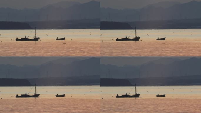 夕阳海面上的小渔船