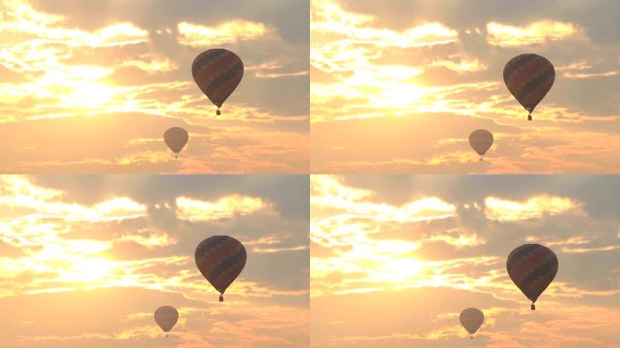 日出时飞行的热气球