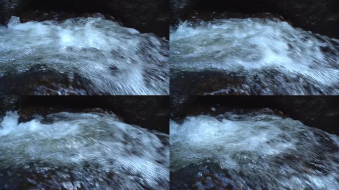 山泉溪流河水溪流山泉水石缝水(慢镜头）
