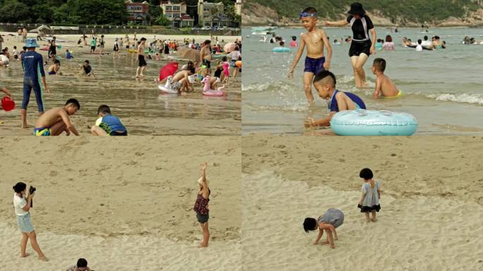 盛夏 阳光明媚的沙滩上 游玩的游客