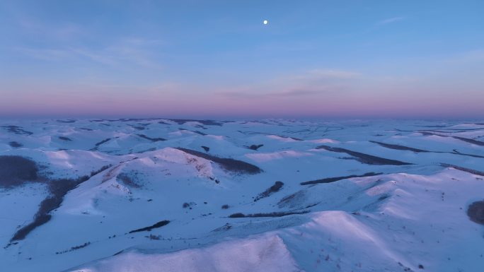 航拍黎明雪原山岭月色