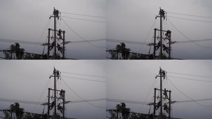 电工电线杆抢修电路修理工雨天安装电线电路