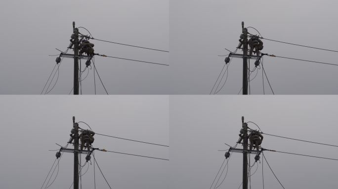 电工电线杆抢修电路修理工雨天安装电线电路