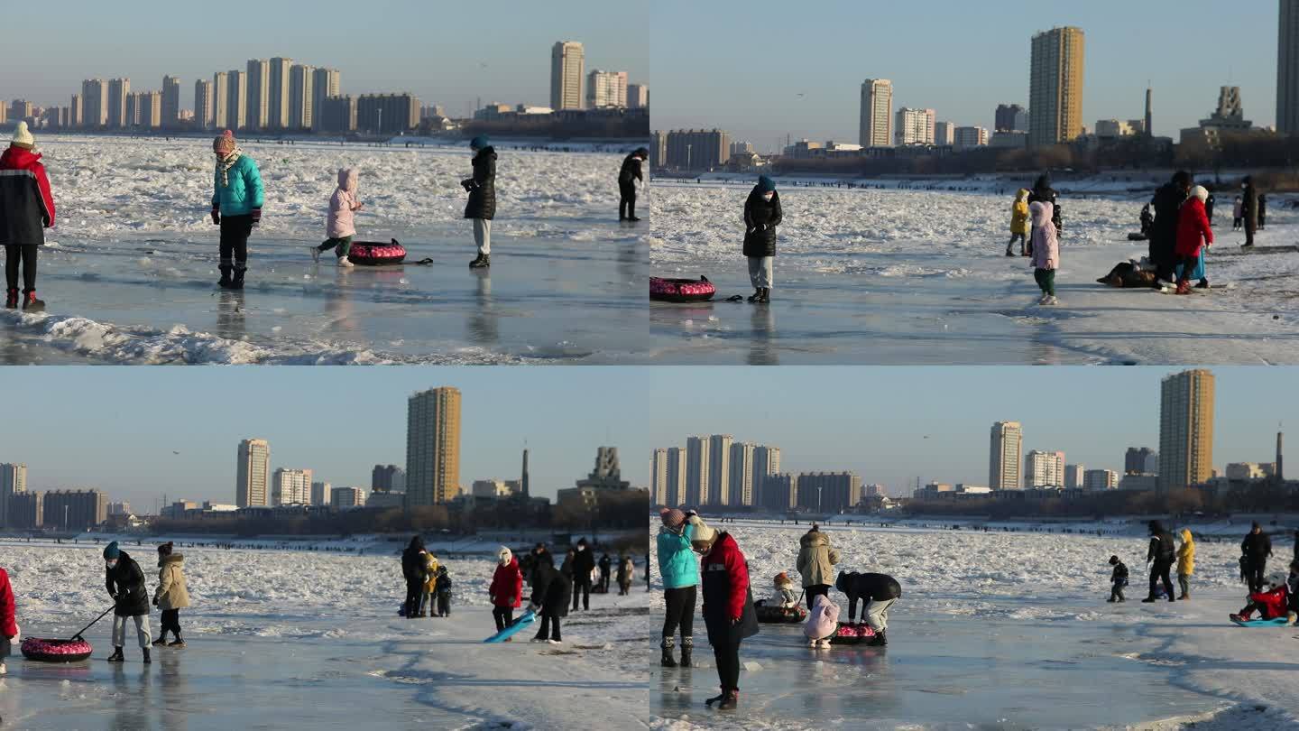 冰冻的松花江上溜冰游戏