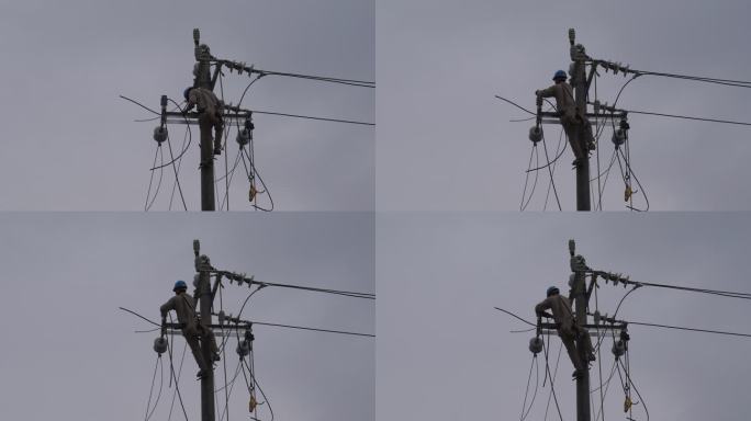 电工电线杆抢修电路修理工雨天安装电线电路