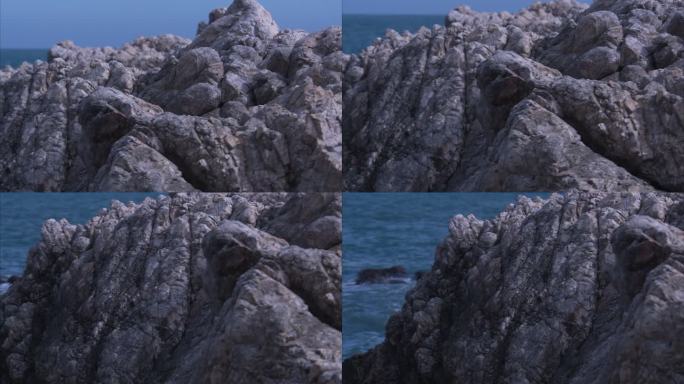 海边巨大的岩石特写 摇