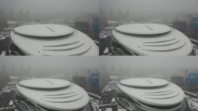 大雪纷飞环绕航拍西安曲江电竞馆
