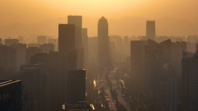 航拍城市夕阳雾霾