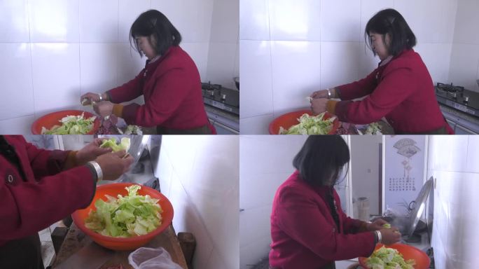 农村妇女在厨房做菜切菜
