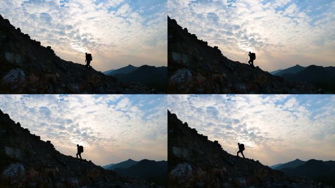 男人登山剪影攀登顶峰登山脚步爬山户外运动