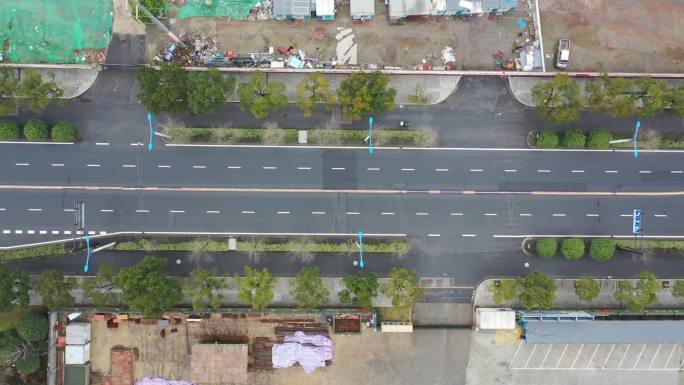 航拍疫情期空荡城市街道马路