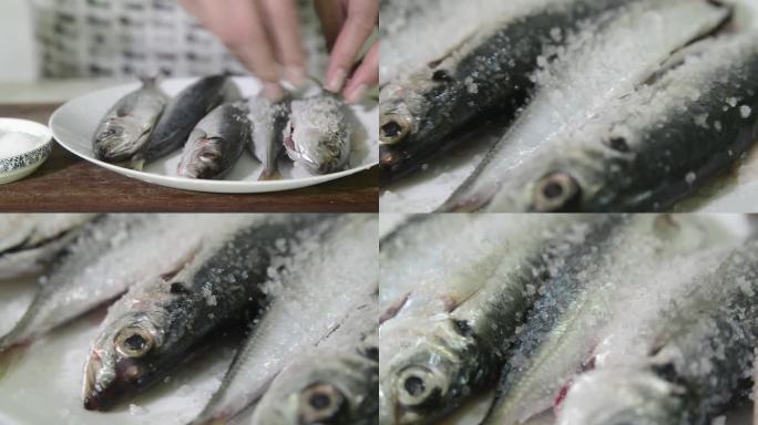腌鱼撒盐腌制鱼类实拍视频