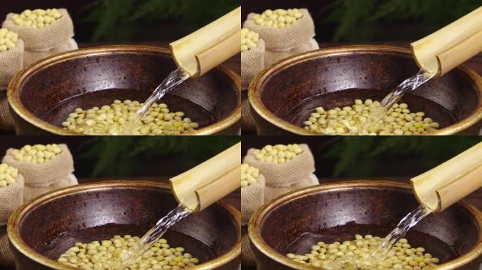 水从竹筒里流到黄豆盆里