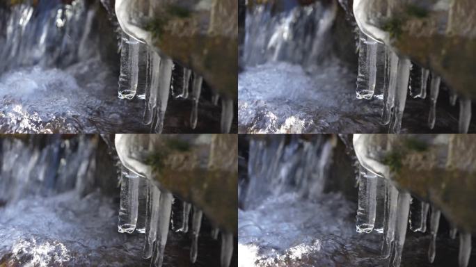 冬天高山溪水瀑布冻冰冰挂冰凌融化春天寒冬