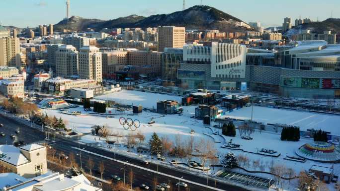 航拍奥林匹克恒隆广场雪景西岗体育场雪景