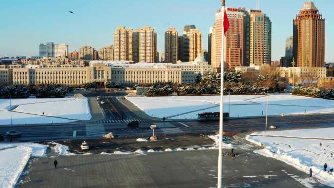 航拍人民广场市政府广场雪景城市交通道路