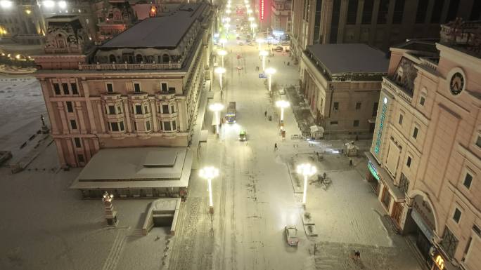 夜晚雪中哈尔滨街道航拍