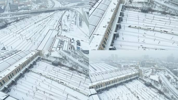 航拍雪天高铁进站