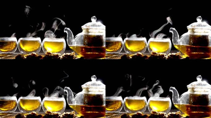 慢动作，热菊花茶，从玻璃罐倒入一杯热白烟。