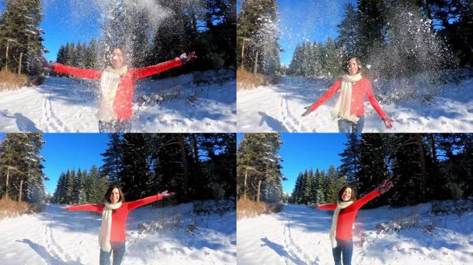 年轻女子扔雪升格镜头撒雪开心笑容笑脸