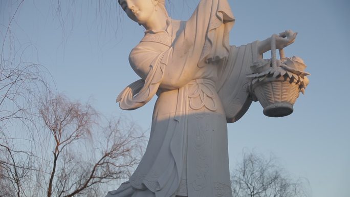 花博会公园里牡丹仙子手持花篮石膏像雕塑