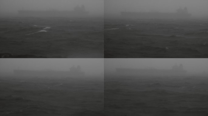 在波涛汹涌的大海中航行的货船的影子