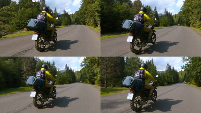 摩托车沿山路骑行的第一人称视角