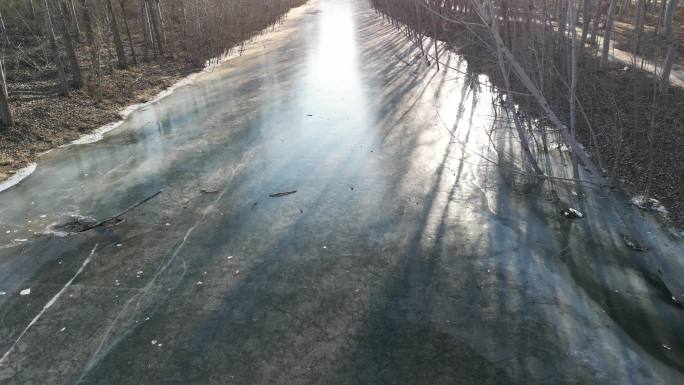 4K航拍阳光下结冰的河流-河北永定河
